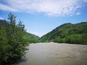 Scenic view of river against sky