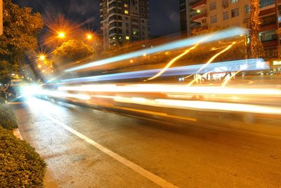 Light trails on city street at night