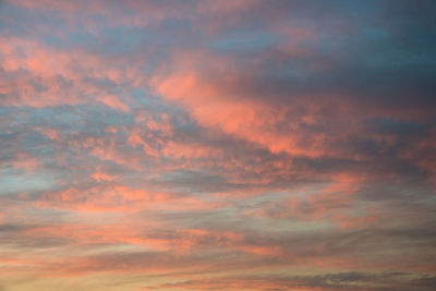 Low angle view of dramatic sky during sunset