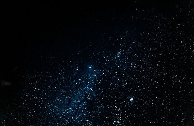 Low angle view of stars in sky at night