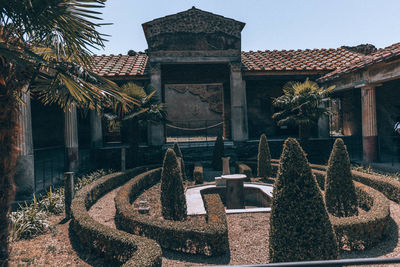 Sculpture of historic building against sky