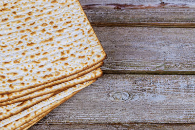 High angle view of crackers on wooden table