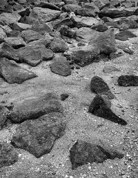 High angle view of footprints on sand