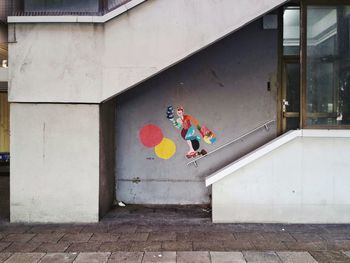 Man in front of building