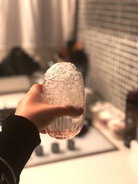 Close-up of woman hand holding drink