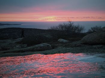 Scenic view of landscape against sky during sunset