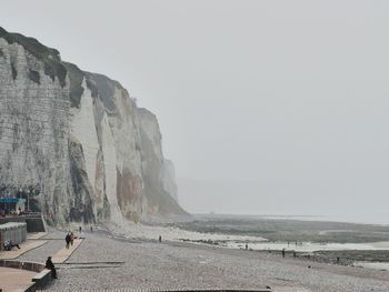 Scenic view of beach against clear sky