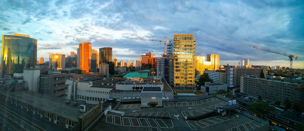 High angle view of buildings in city against sky