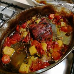 High angle view of meat in cooking pan