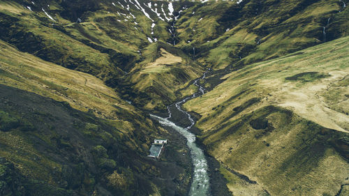 High angle view of road amidst mountains