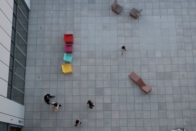 High angle view of people walking on wall
