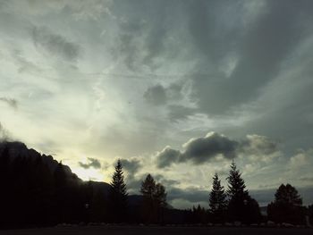 Silhouette trees against sky