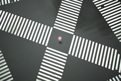 High angle view of office sign on road in city