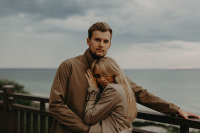 Love story of a young boy and girl. solitude with the sea one on one. baltic sea,  sylt-ost, germany