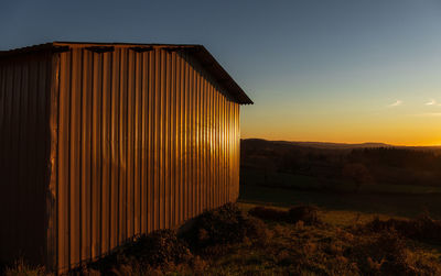 Agriculture building in sunset