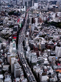 High angle view of street amidst buildings in city