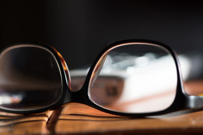 Close-up of sunglasses on table