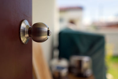 Close-up of wine on glass door