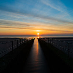 Scenic view of sea against sky during sunrise