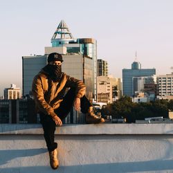 Man wearing sunglasses against clear sky