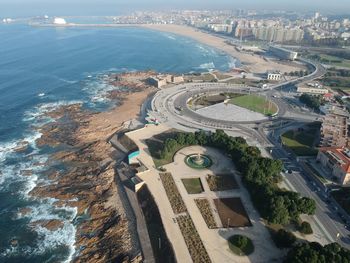 High angle view of road by sea against sky