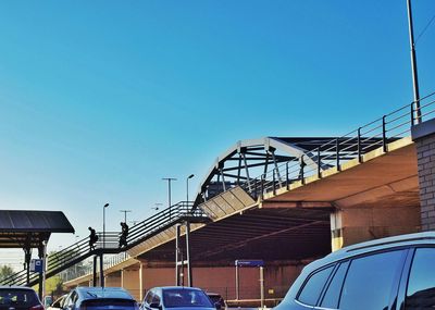 Low angle view of built structure against clear blue sky