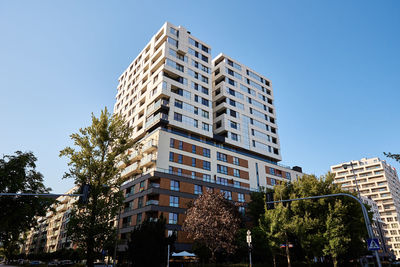 Modern residential building in warsaw, poland. city architecture