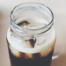 Close-up of glass of jar on table