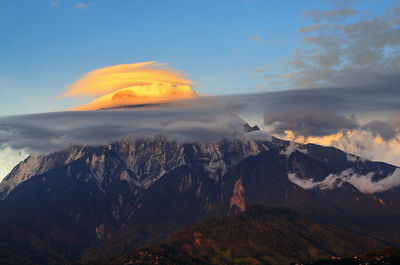 Scenic view of mountains against sky during sunset