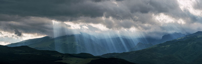 Panoramic view of mountains against sky