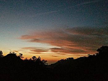 Scenic view of dramatic sky during sunset