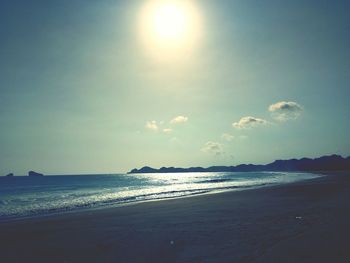 Scenic view of beach against clear sky