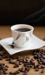 Close-up of coffee cup on table