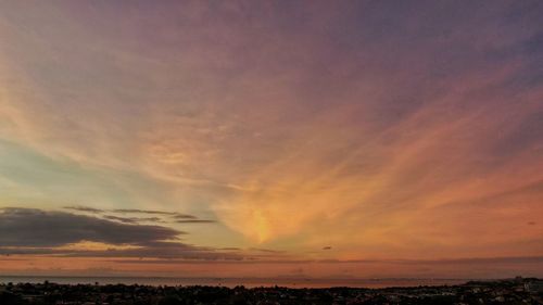 Scenic view of dramatic sky during sunset