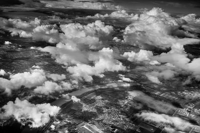 High angle view of clouds over cityscape