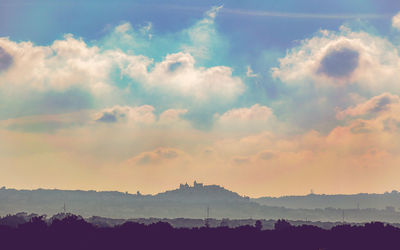 Scenic view of silhouette landscape against sky