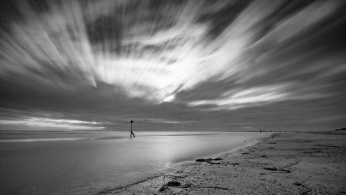 Scenic view of beach against sky