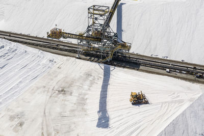Salt piled up harvested from evaporation ponds in sf bay aerial