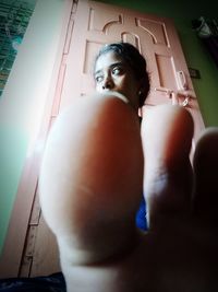 Portrait of shirtless man at home