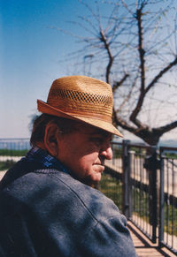 Portrait of man wearing hat against sky