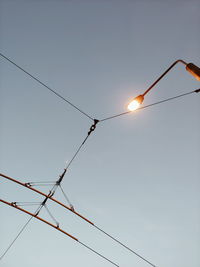 Low angle view of street light against clear sky