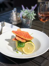 Close-up of fruits served in plate on table