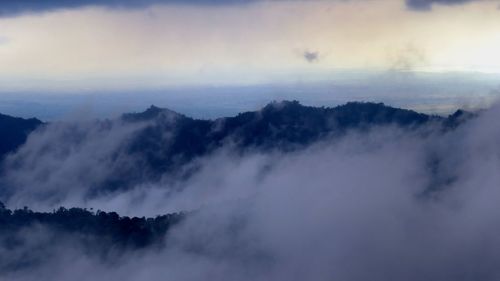 Scenic view of mountains against sky during sunset