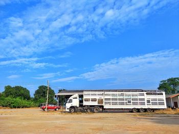 Cars against blue sky