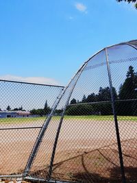 Chainlink fence against clear sky