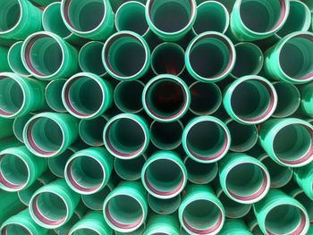 Full frame shot of green drinking straws