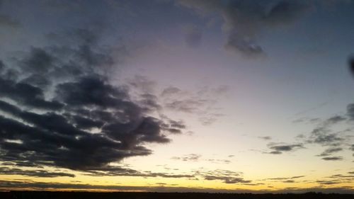 Low angle view of dramatic sky during sunset