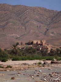 Scenic view of desert against mountains