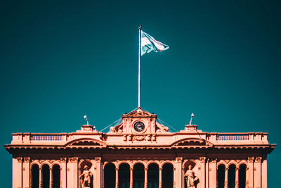 Low angle view of building against blue sky