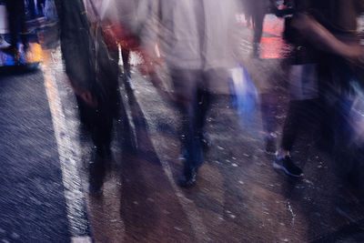 Blurred motion of people at night